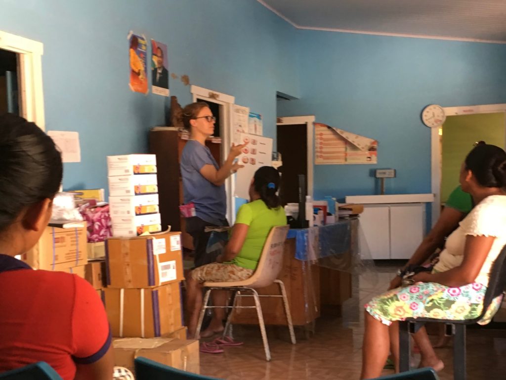 Pictured center, Dr. Loehr teaches a cervical cancer lecture in Guyana.