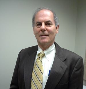 Dr. Neil R. Scheier